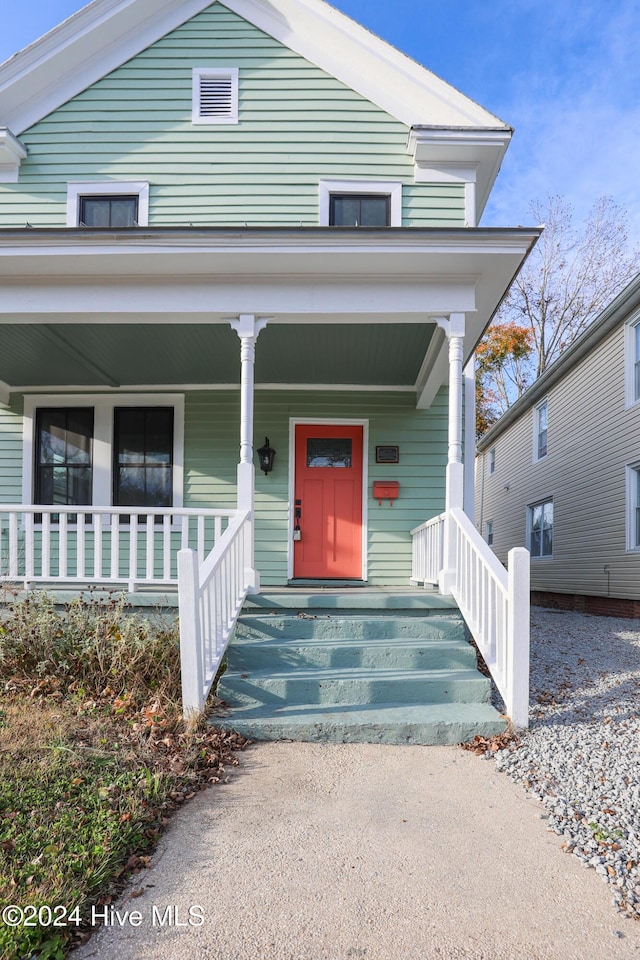 view of front of home featuring covered porch