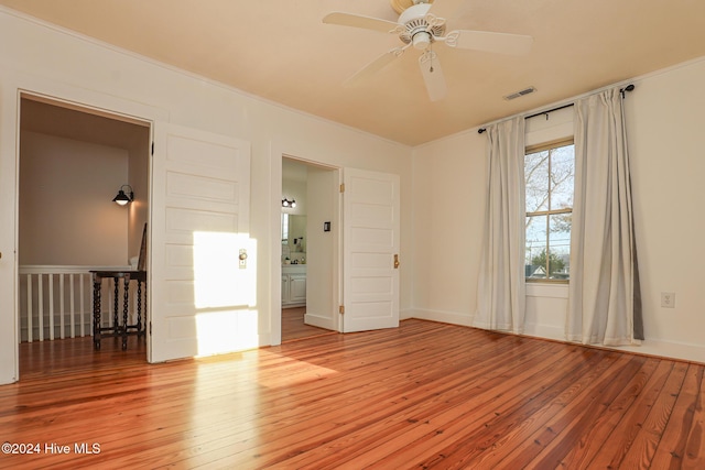 spare room with ceiling fan and light hardwood / wood-style flooring