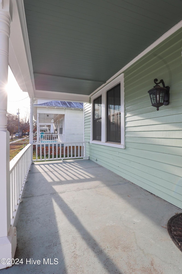 view of patio featuring a porch