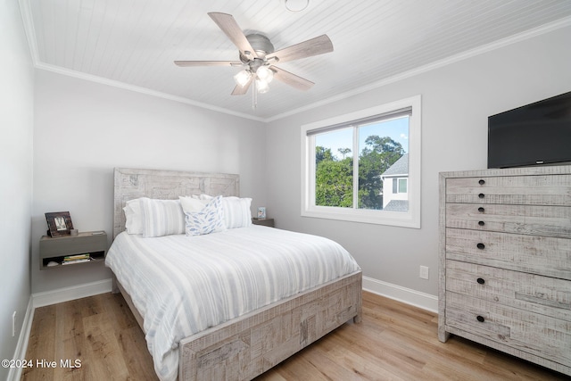 bedroom featuring ceiling fan, wooden ceiling, crown molding, and light hardwood / wood-style flooring