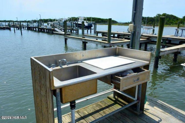 view of dock featuring a water view