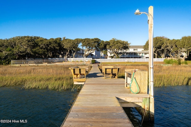 view of dock with a water view