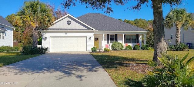 view of front facade with a garage and a front lawn