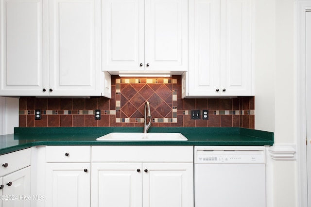 bar with dishwasher, backsplash, and a sink