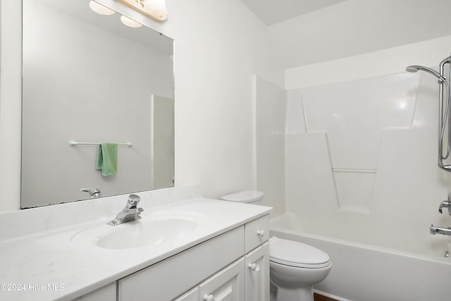 full bathroom featuring vanity, shower / bathtub combination, and toilet