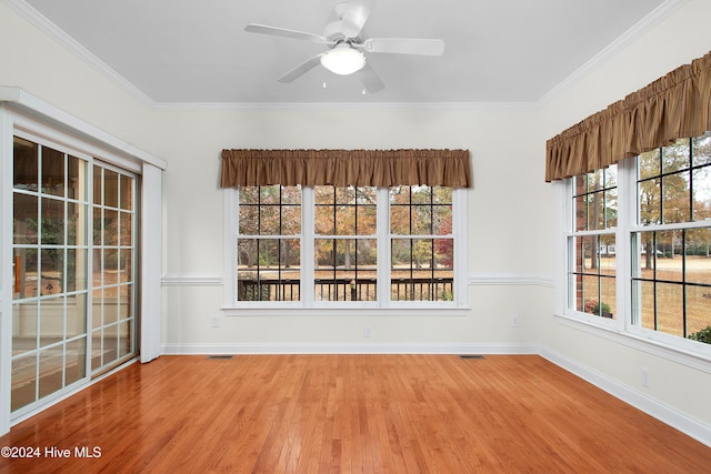 interior space with ceiling fan