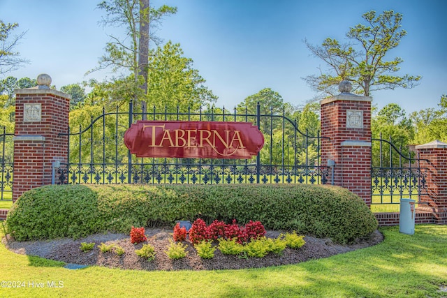 community sign with fence