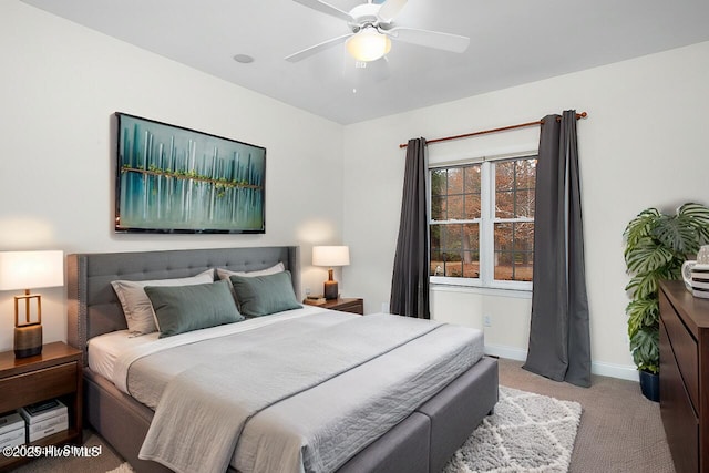 bedroom featuring carpet floors, ceiling fan, and baseboards