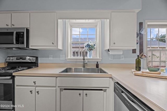 kitchen featuring white cabinets and stainless steel appliances