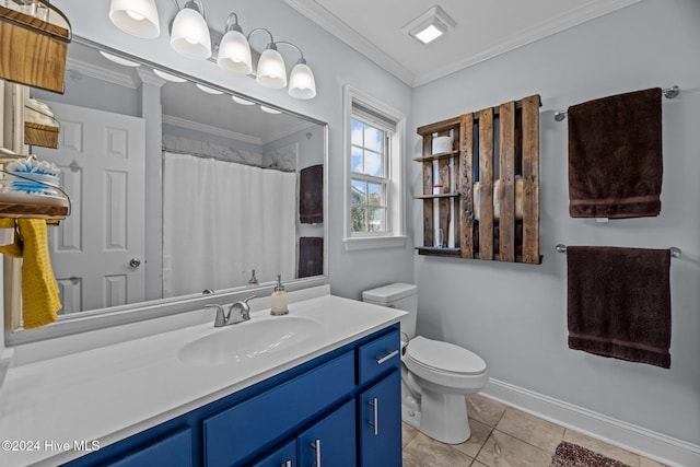 bathroom with toilet, vanity, tile patterned floors, and crown molding