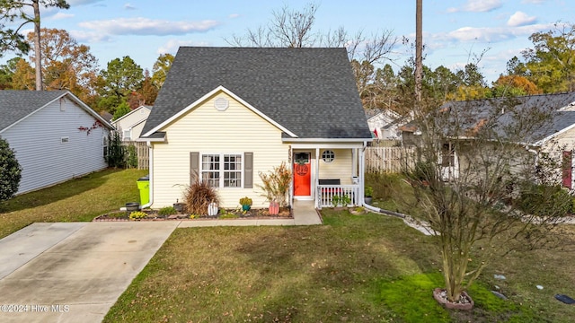 bungalow-style house with a porch and a front yard