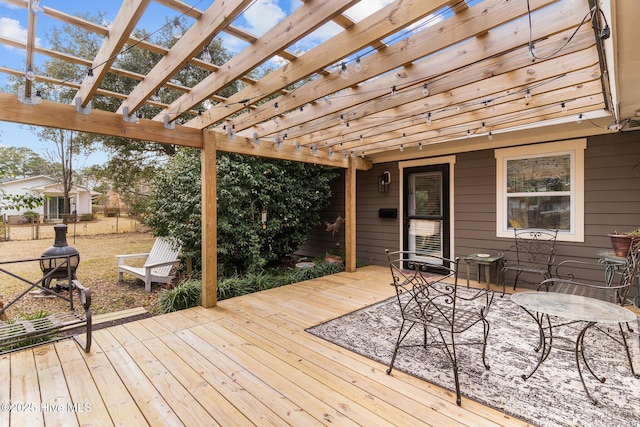 wooden terrace with a pergola