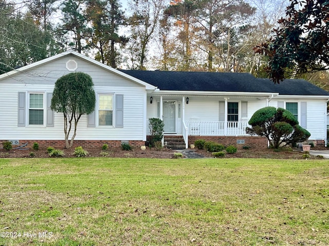 ranch-style home with a front yard