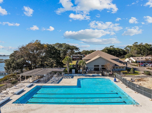 view of swimming pool with a patio area