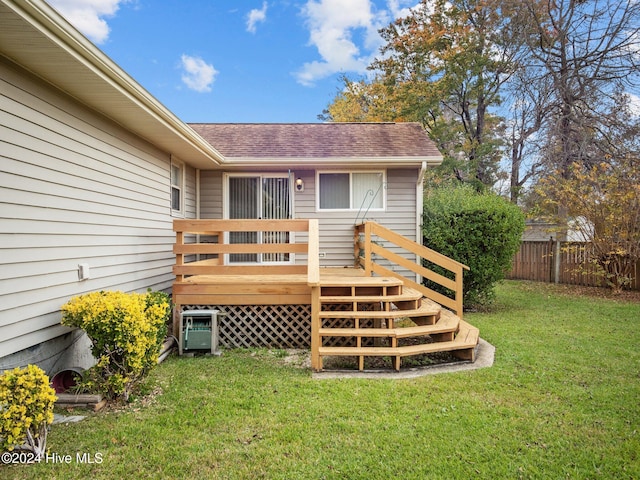 entrance to property with a deck