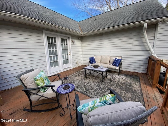 wooden terrace featuring outdoor lounge area