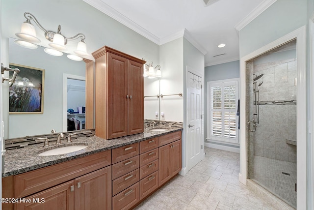 bathroom featuring decorative backsplash, ornamental molding, vanity, and walk in shower