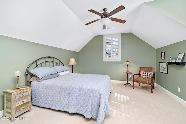 bedroom featuring lofted ceiling, carpet floors, and ceiling fan