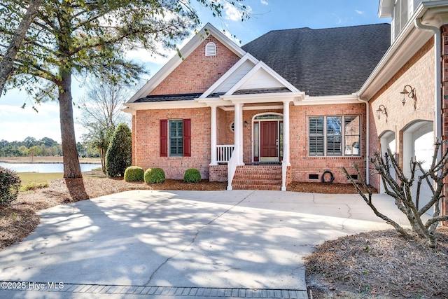 view of front of home featuring a water view