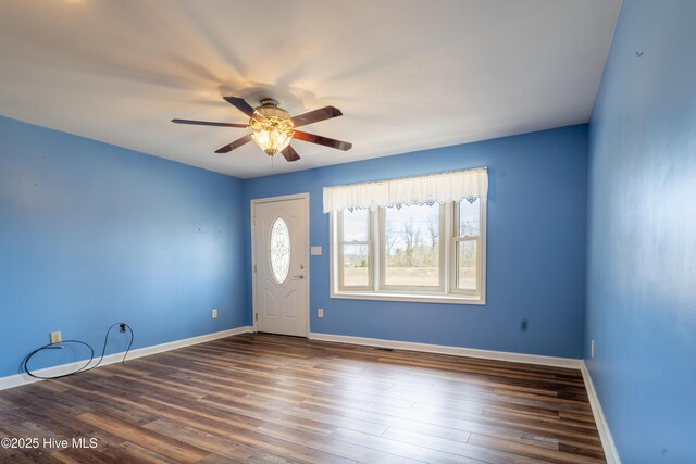 living room featuring dark wood-type flooring and a brick fireplace