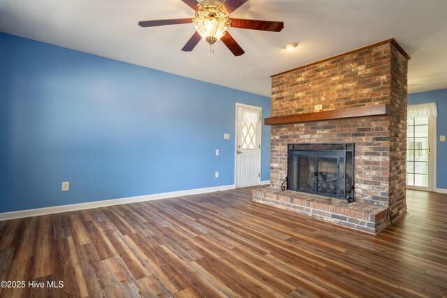 bedroom with ceiling fan, light colored carpet, multiple windows, and a textured ceiling