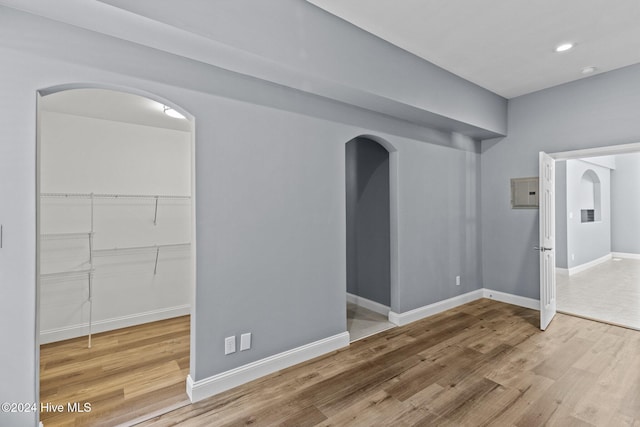 spare room featuring hardwood / wood-style flooring