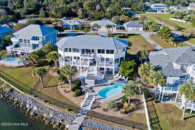 105 Wind Dance Ln, Swansboro, NC 28584 - aerial perspective of suburban area featuring a pool