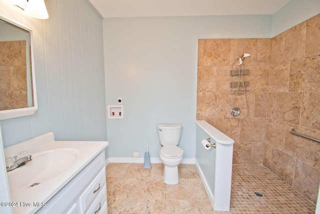105 Wind Dance Ln, Swansboro, NC 28584 - bathroom featuring vanity, a tile shower, and toilet