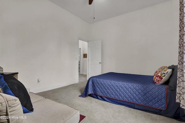 bedroom featuring ceiling fan, carpet floors, and baseboards