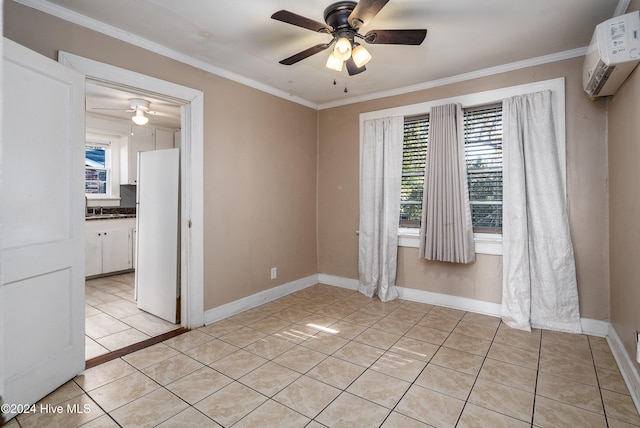 spare room with ornamental molding, a wall unit AC, ceiling fan, sink, and light tile patterned flooring