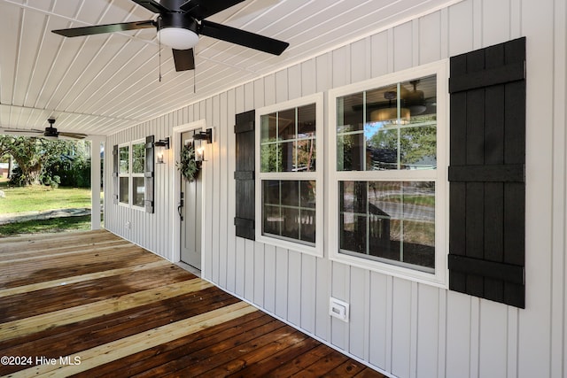 wooden terrace with ceiling fan