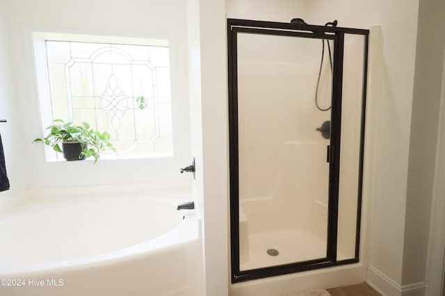 bathroom with plus walk in shower