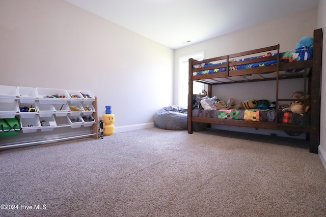 bedroom featuring carpet