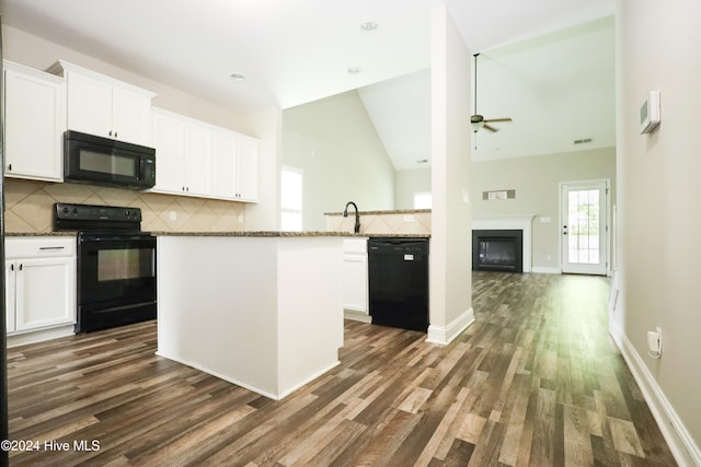 kitchen featuring dark wood-type flooring, black appliances, decorative backsplash, ceiling fan, and white cabinetry