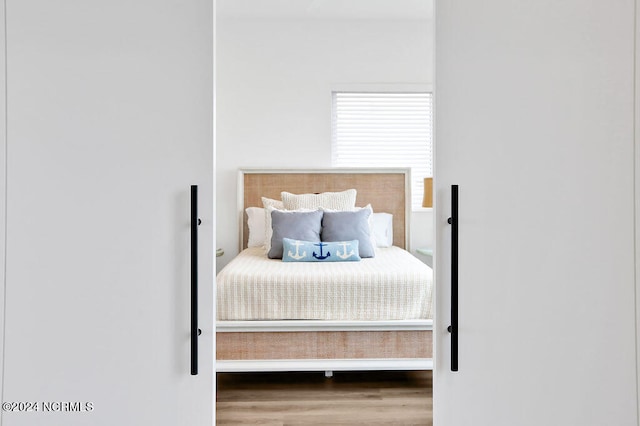 bedroom featuring hardwood / wood-style floors