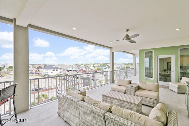 interior space with a balcony and an outdoor hangout area