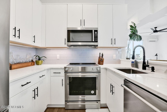 kitchen with white cabinets and stainless steel appliances