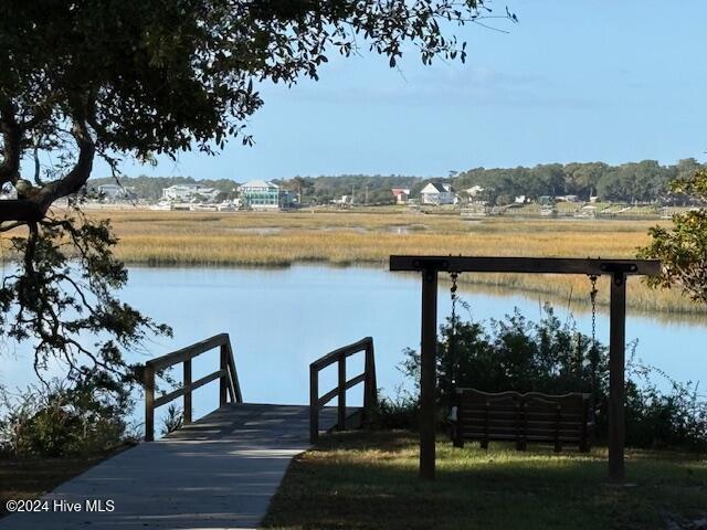 view of dock with a water view