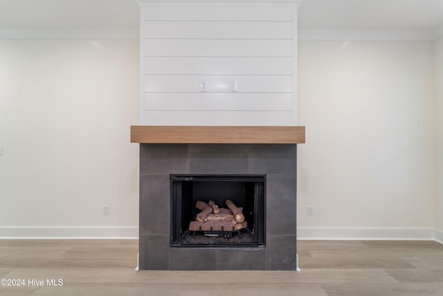 details with crown molding and hardwood / wood-style floors