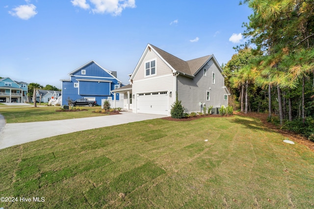 view of front of house featuring an attached garage, concrete driveway, and a front yard