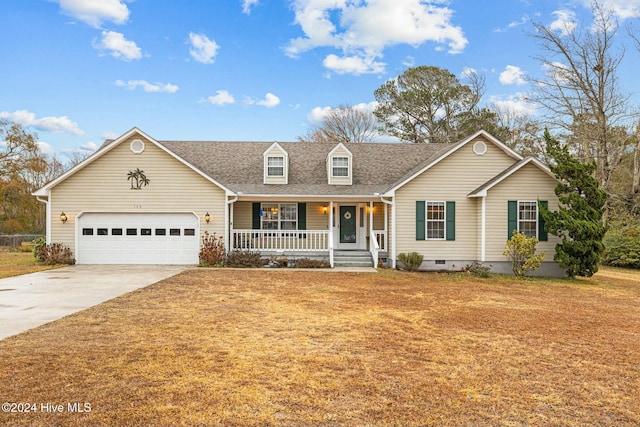 view of front of property featuring a porch and a garage