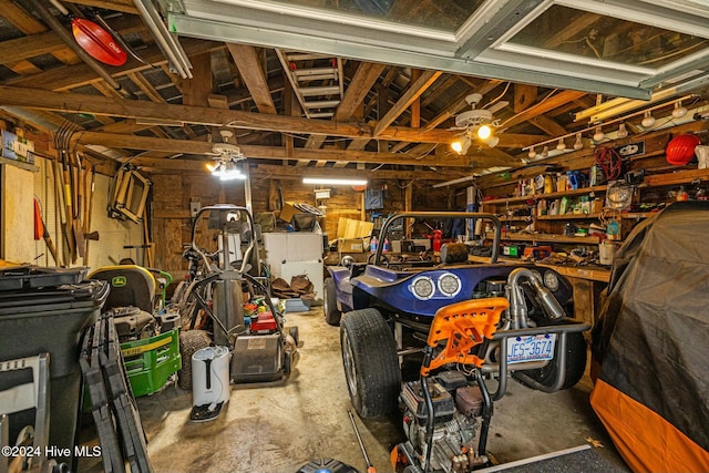 garage with a workshop area