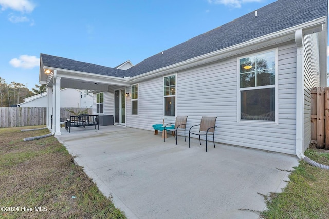 rear view of house featuring a patio area