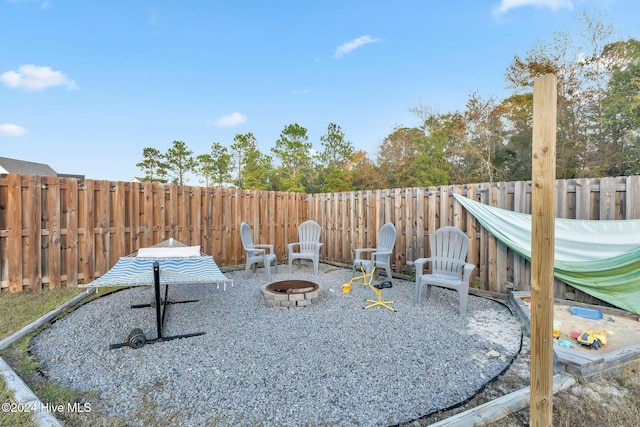 view of patio / terrace featuring a fire pit