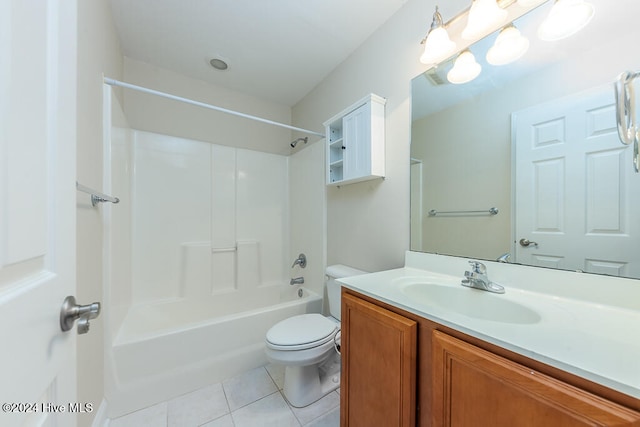 full bathroom featuring tile patterned flooring, shower / tub combination, vanity, and toilet