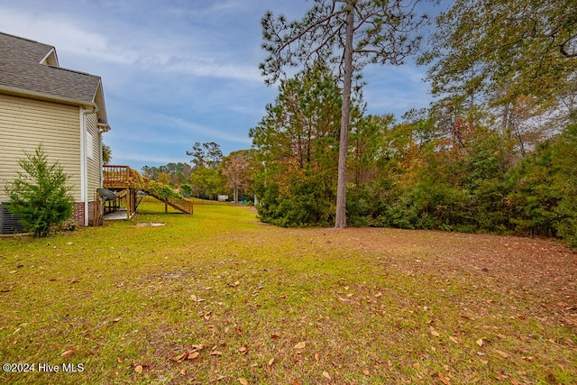 view of yard featuring a deck