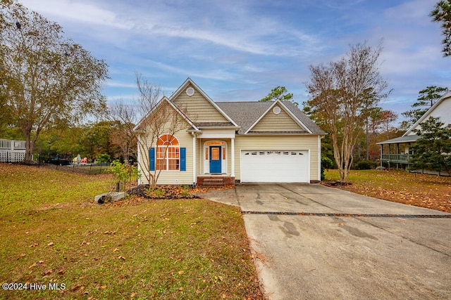 view of front facade with a garage and a front yard