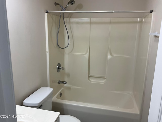 full bathroom featuring vanity, shower / bathtub combination, and toilet