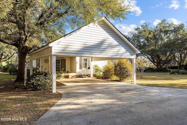 view of front of house featuring a carport