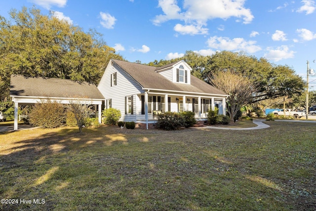 view of front facade with covered porch and a front yard